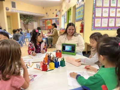 Preschool children enjoying hands-on cooking and science experiments as part of Village Preschool Academy's summer curriculum